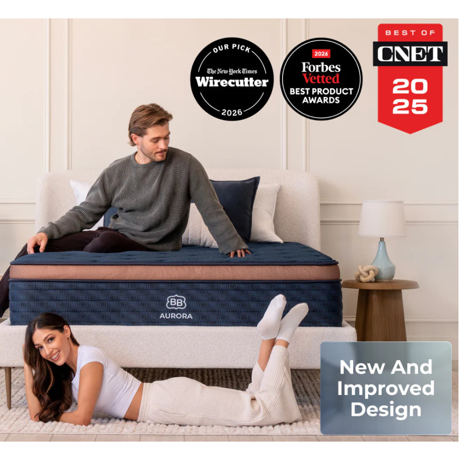 Two people on a blue Aurora mattress with awards displayed above them